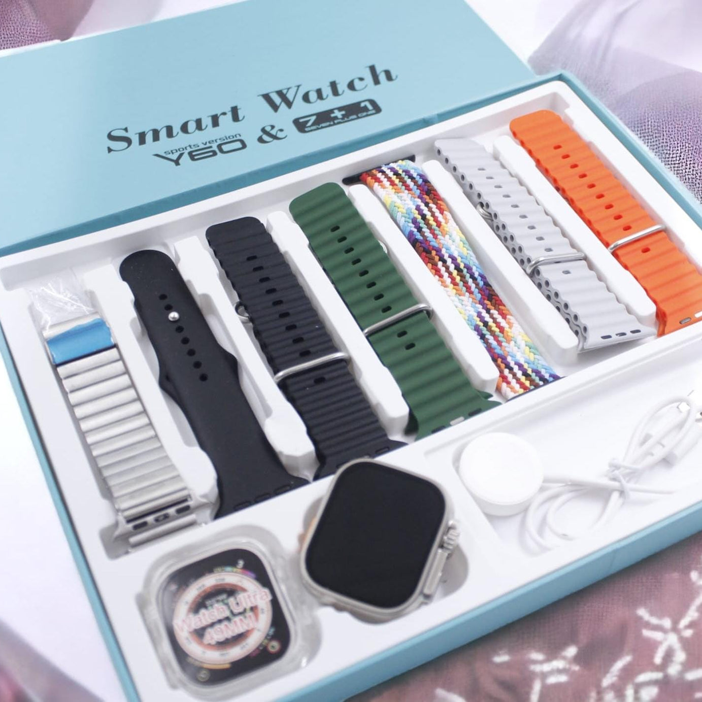 Ultra Y60 Premium Quality 8 in 1 Smartwatch – 7 Variable Straps & Chain & Ocean Strap With Ultra Watch Case & Wireless Charger in just Rs 6499